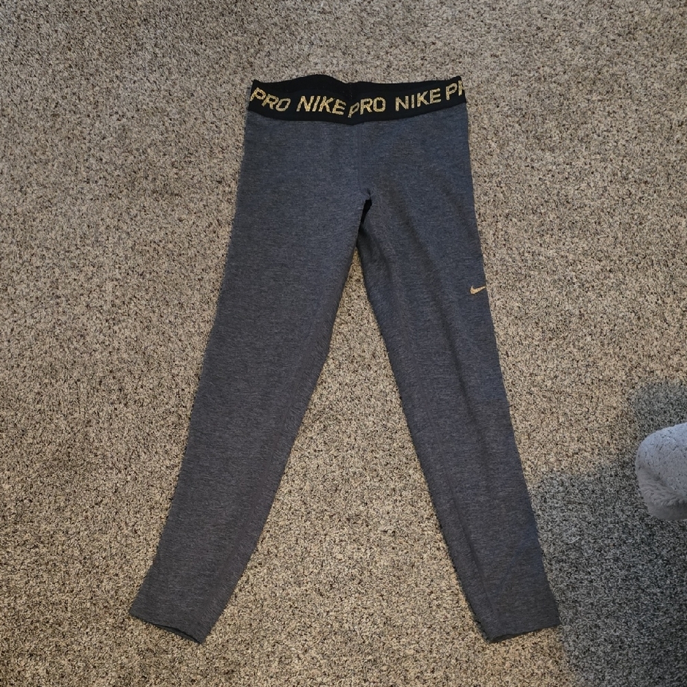 Nike Pro Gray Leggings with Gold Accents